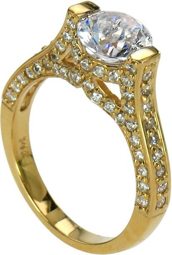 Round 1.5 Carat Tension Set Pave Solitaire Ring with laboratory grown diamond look cubic zirconia in 14k yellow gold.
