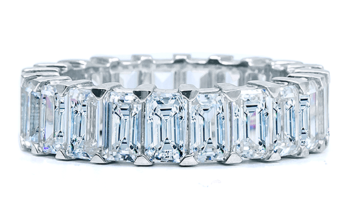 Sinclair .50 carat each emerald cut lab grown diamond look cubic zirconia eternity band in 14k white gold.