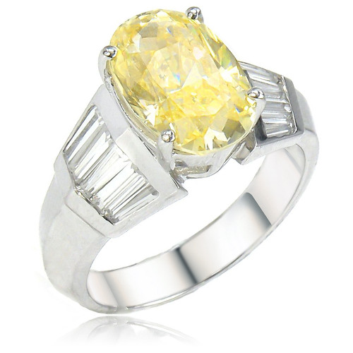 Oval 3.5 Carat Channel Set Tapered Baguette Engagement Ring with lab grown diamond simulant cubic zirconia in 14k white gold.