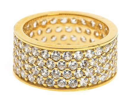 Pave set round four row lab grown diamond alternative cubic zirconia eternity band in 14k yellow gold.