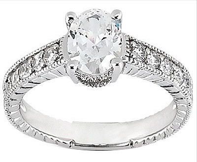 Claudine 1.5 carat oval lab grown diamond simulant cubic zirconia pave engraved solitaire engagement ring in 18k white gold.