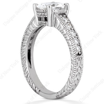 Claudine 1.5 carat oval lab grown diamond look cubic zirconia pave engraved solitaire engagement ring in platinum.