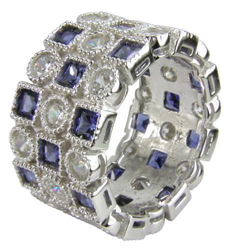 Asante princess cut man made sapphire and lab grown diamond alternative cubic zirconia round bezel set eternity band in platinum.