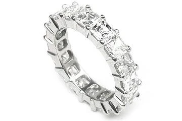 Asscher Cut .75 carat each lab grown diamond alternative cubic zirconia prong set eternity band set in 14k white gold and platinum.