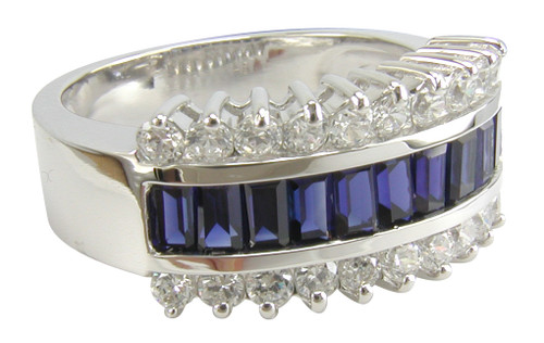 Jazz channel set man made sapphire baguette and round lab grown diamond simulant cubic zirconia anniversary band in 14k white gold.