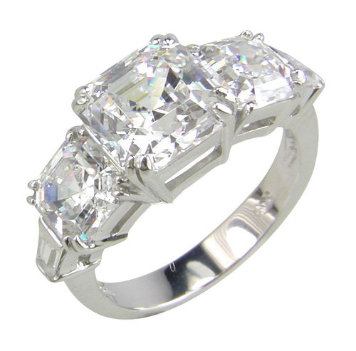Asscher cut 2.5 carat laboratory grown diamond simulant cubic zirconia three stone engagement ring with baguette accents in 14k white gold.