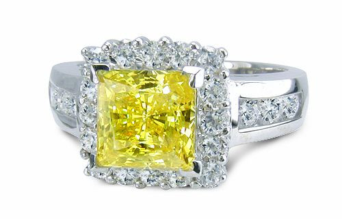 Nina Princess 1.5 carat princess cut laboratory grown diamond alternative cubic zirconia halo and channel set round engagement ring in platinum.
