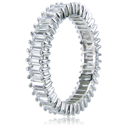 Baguette single prong set laboratory grown diamond simulant cubic zirconia eternity band in platinum.