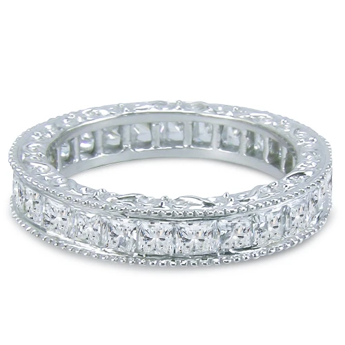 Engraved victorian channel set princess cut lab grown diamond quality cubic zirconia engraved eternity wedding band in platinum.