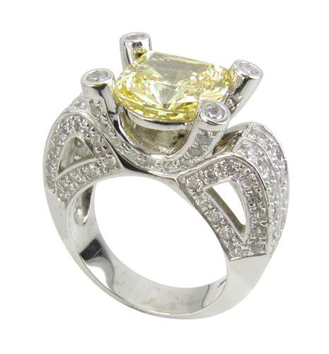 Optimus 5.5 carat cushion cut laboratory grown diamond simulant solitaire in 14k white gold.