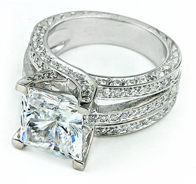 Cassis 4 carat princess cut lab grown diamond alternative cubic zirconia pave solitaire engagement ring in platinum.