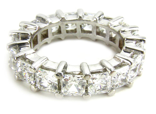 Medium .35 carat each round laboratory grown diamond alternative cubic zirconia shared prong set eternity band.