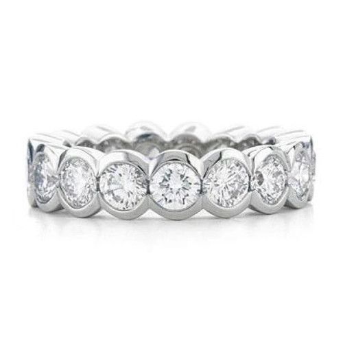 Semi bezel set round lab created cubic zirconia eternity band in 14k white gold, 14k yellow gold and platinum.