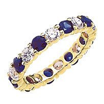 Medium 3.5mm each round laboratory grown diamond alternative cubic zirconia shared prong set eternity band.