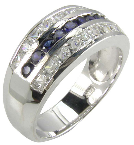 Channel set round simulated man made sapphire and princess cut lab grown diamond simulant cubic zirconia band in 14k white gold.