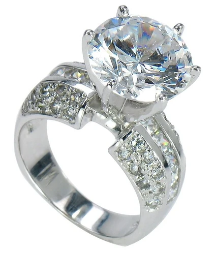 Riviera 5.5 carat round channel set princess cut and pave lab grown diamond look cubic zirconia engagement ring in 14K white gold.