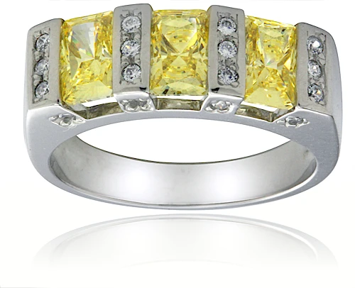 Ria channel set canary radiant emerald cut lab grown diamond quality cubic zirconia pave anniversary band in 14k white gold.