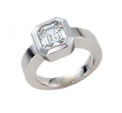 Bezel Set 1.5 Carat Asscher Cut Solitaire Engagement Ring with lab grown diamond look cubic zirconia in 14k white gold.