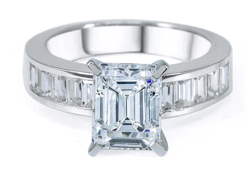 Emerald Step Cut 2.5 Carat Channel Set Baguette Solitaire Engagement Ring with lab grown diamond look cubic zirconia in platinum.