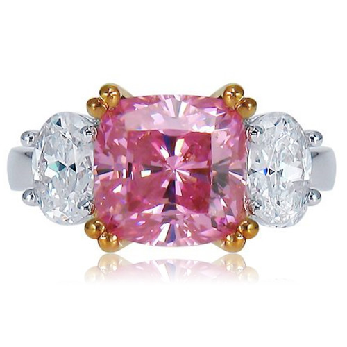 Pink 2.5 carat cushion cut lab grown diamond simulant cubic zirconia with ovals in 14k two tone rose gold.