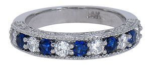 Markham estate sapphire and round lab grown diamond quality cubic zirconia antique anniversary band in platinum.