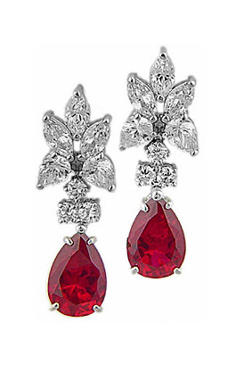 Pear cluster earrings with a 5 carat man made ruby pear drop in 14k white gold.