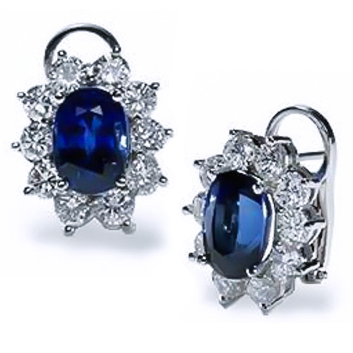 Oval 2.5 carat each man made sapphire and lab grown diamond look cubic zirconia cluster earrings in 14k white gold.