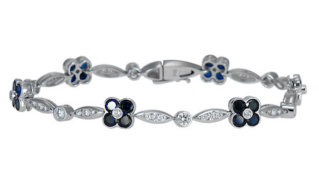 Florinada Flower Style Round and Man Made Sapphire Gemstone Bracelet with lab grown diamond quality cubic zirconia in 14k white gold.