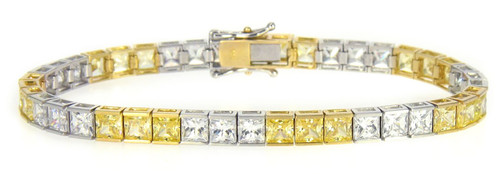 Alternating canary lab grown diamond look cubic zirconia tennis bracelet in two tone 14k gold.