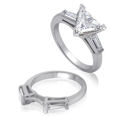 Trillion triangle lab grown diamond look cubic zirconia baguette solitaire engagement ring with matching wedding band in 14k white gold.