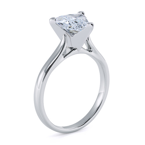 Trillion triangle laboratory grown diamond simulant cubic zirconia cathedral solitaire engagement ring in platinum.