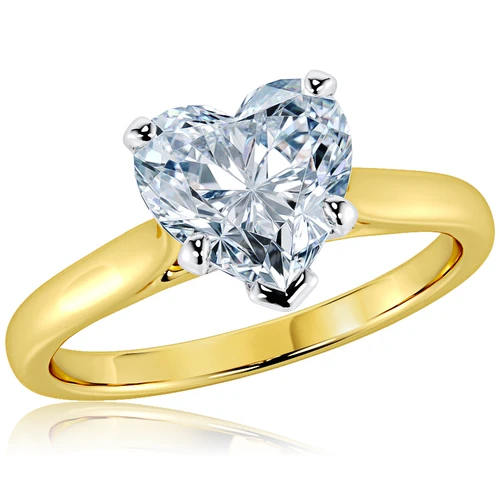 Heart shape lab grown diamond simulant cubic zirconia cathedral solitaire engagement ring in 18k yellow gold with platinum prongs.