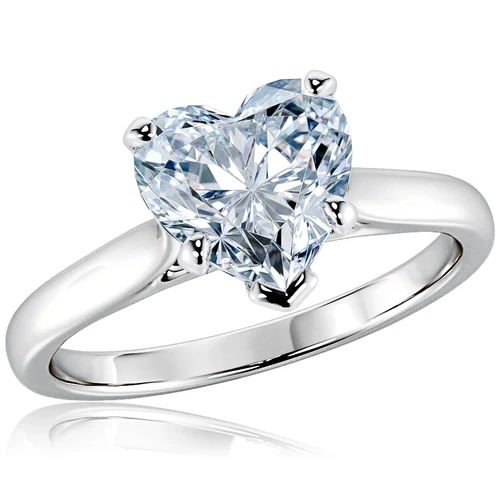 Heart shape lab grown diamond simulant cubic zirconia cathedral solitaire engagement ring in 18k white gold with platinum prongs.