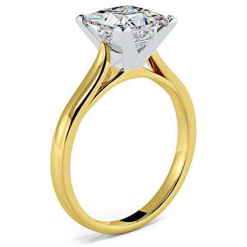 Princess cut square laboratory grown diamond simulant cubic zirconia cathedral solitaire engagement ring in 14k yellow gold with white gold prongs.