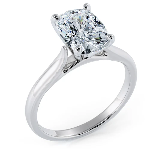 Elongated cushion cut lab grown diamond look cubic zirconia cathedral solitaire engagement ring in 14k white gold.