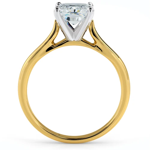 Elongated cushion cut lab grown diamond simulant cubic zirconia cathedral solitaire engagement ring in 14k yellow gold with white gold prongs.