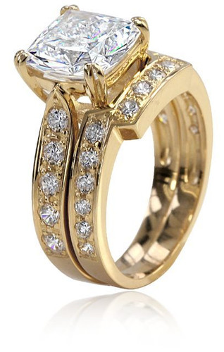 Winston 4 Carat Cathedral Cushion Cut Bridal Set with simulated laboratory grown diamond quality cubic zirconia in 14k yellow gold.