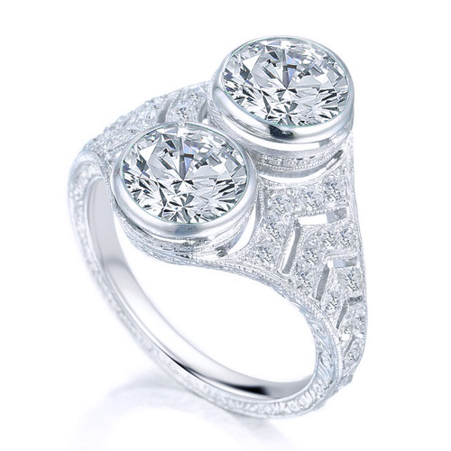 Nouveau 1.5 carat each bezel set double round lab grown diamond alternative cubic zirconia antique estate style ring in platinum.