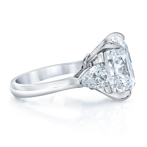 Cushion cut with store pear side stones