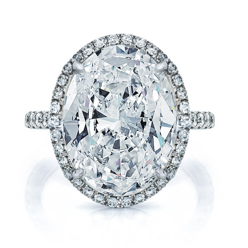 Ovazzio Oval laboratory created diamond alternative cubic zirconia halo pave ring in 14K white gold.