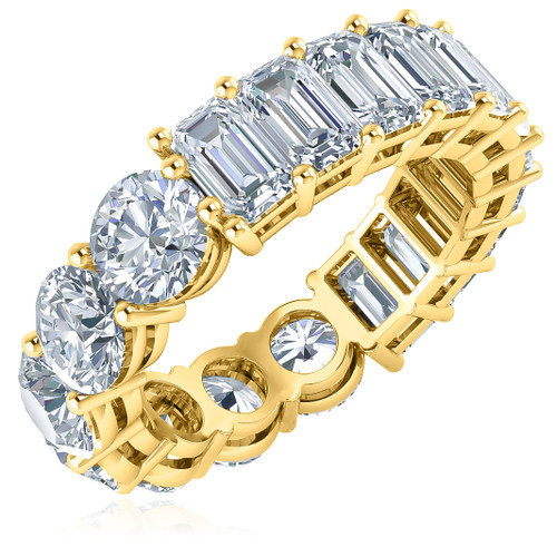 Alternity .50 carat round and emerald step cut lab grown diamond alternative cubic zirconia eternity band in 14k yellow gold.