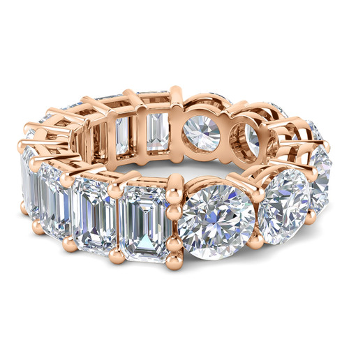 Alternity .75 carat round and emerald step cut lab grown diamond simulant cubic zirconia eternity band in 14k rose gold.