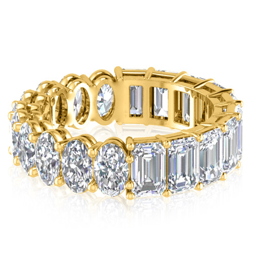 Alternity .25 carat oval and emerald step cut lab grown diamond look cubic zirconia eternity band in 14k yellow gold.