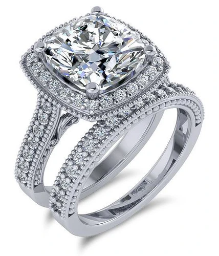 Cushion cut cathedral style pave laboratory grown diamond look cubic zirconia bridal set in 14k white gold.
