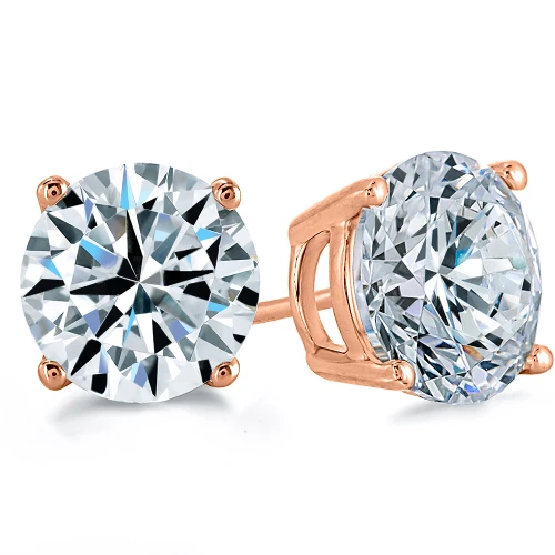 Round lab-grown diamond four prong basket set stud earrings in 14k rose gold.