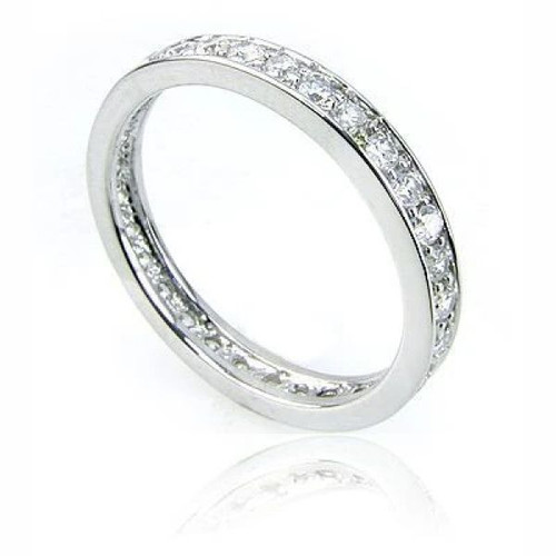 Round .75 carat bezel halo lab grown diamond alternative cubic zirconia solitaire bridal set in platinum.