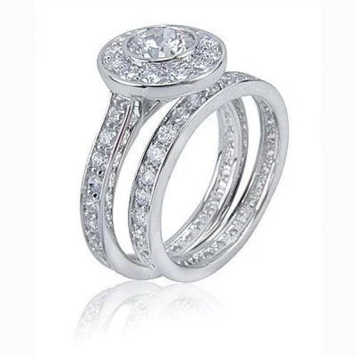 Round .75 carat bezel halo lab grown diamond quality cubic zirconia solitaire bridal set in 14k white gold.