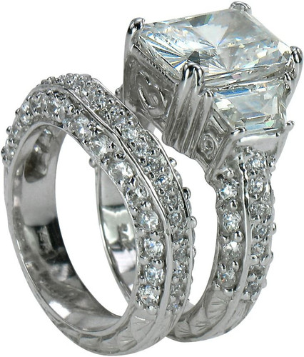 Emerald cut 5.5 carat lab grown diamond alternative cubic zirconia wedding set with contoured band in 14k white gold.