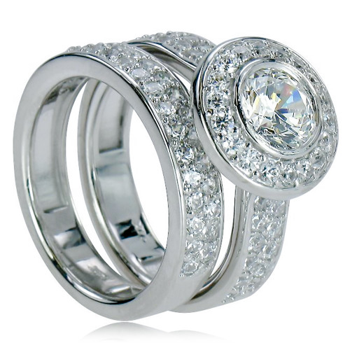 Round halo 1 carat lab grown diamond look cubic zirconia pave set wedding set in 14k white gold.