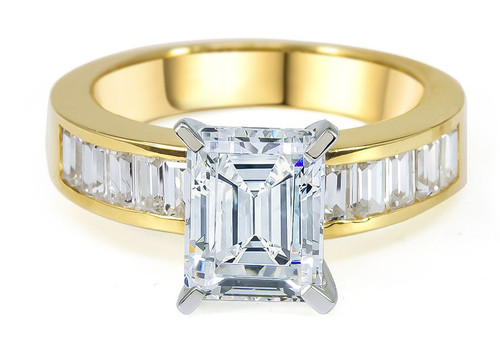 Emerald step cut 2.5 carat lab grown diamond simulant cubic zirconia graduated baguette solitaire engagement ring 14k yellow gold.